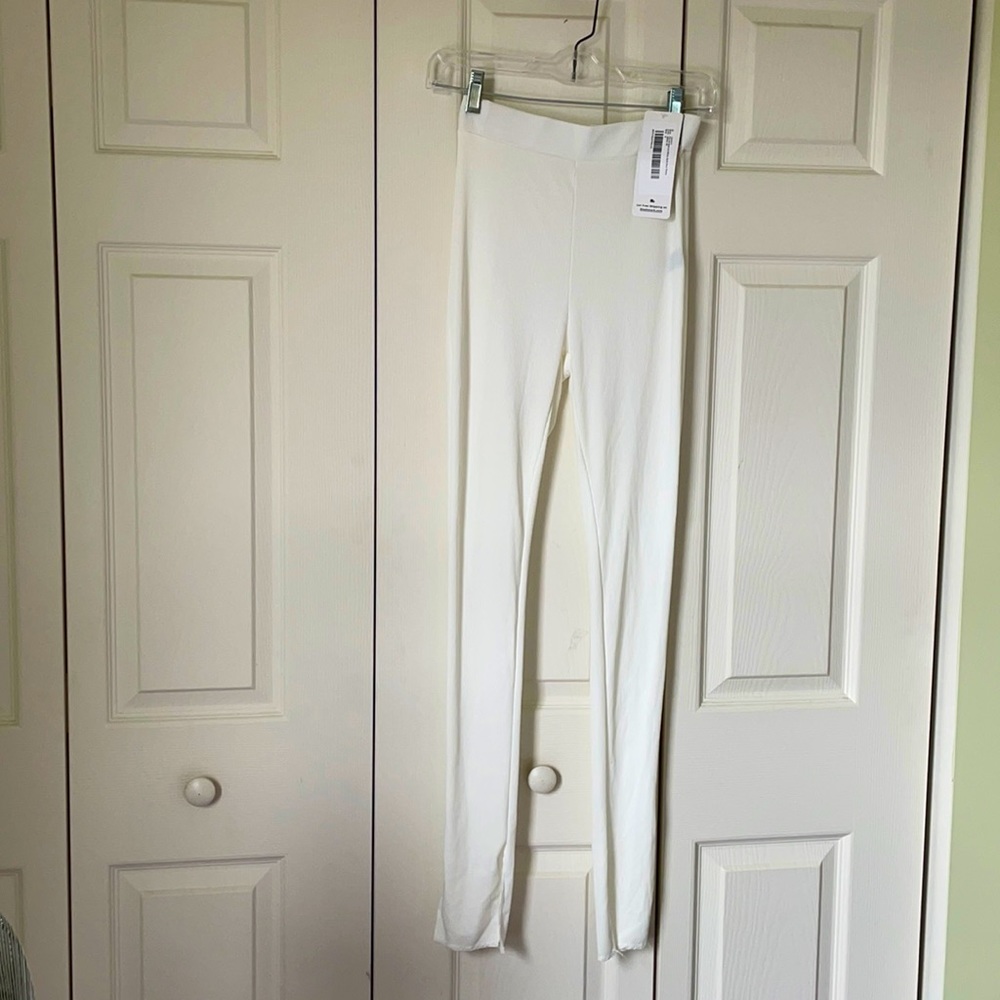 White stretchy wide leg pants. Size S. New